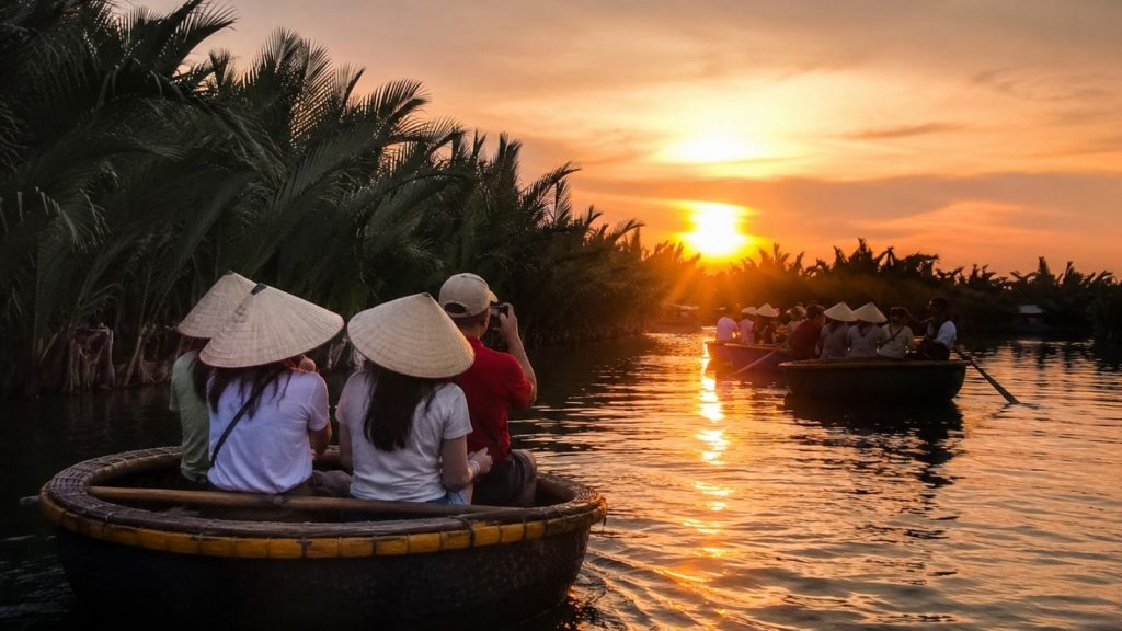Best Cam Thanh Coconut Village Tour for a Unique Hoi An Experience 7 Tourists riding basket boats at sunset in Cam Thanh Coconut Village.