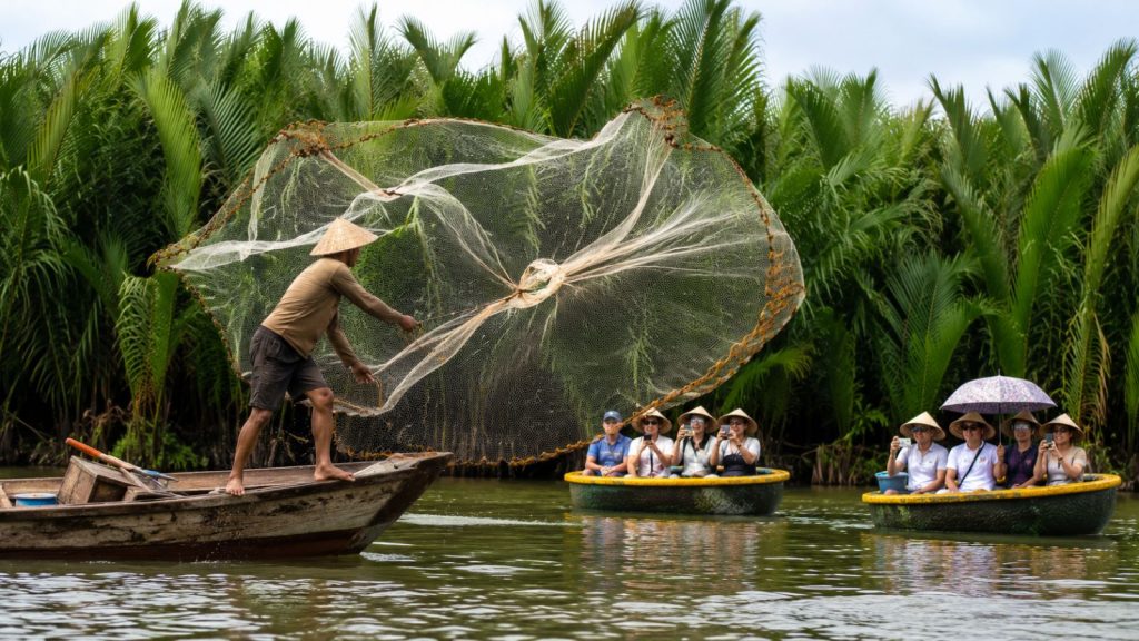 A local fisherman casts a large fishing net while tourists watch from basket boats during a Cam Thanh Coconut Forest tour in Hoi An.
