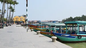 Làng Dừa Xanh 142 Sunny blue skies over the riverfront in Hoi An Ancient Town during dry season