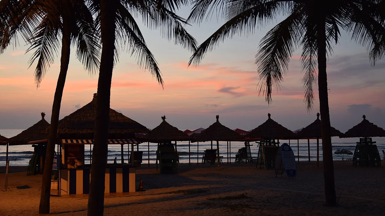 Sunny sandy beach and turquoise waters along Central Vietnam coast near Hoi An