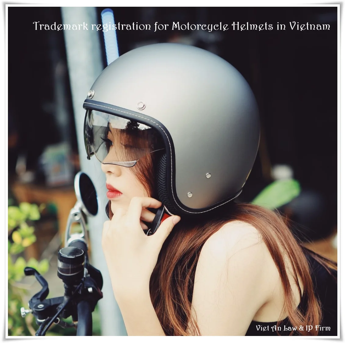 Tourist wearing certified full-face motorcycle helmet following Vietnam road safety laws on scooter ride to Hoi An