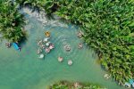 Clear Water View of Coconut Basket Boat Hoi An