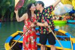 Couple Riding Coconut Basket Boat Hoi An